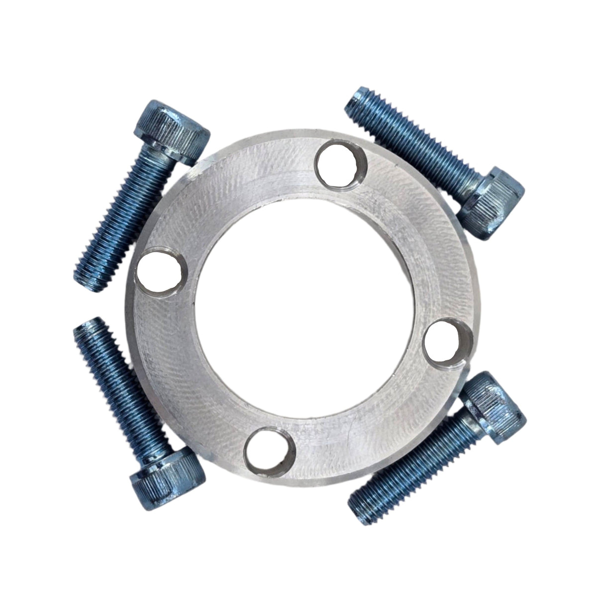 TVS900 1.6-liter Miata pulley spacer and four bolts arranged in a straight overhead view