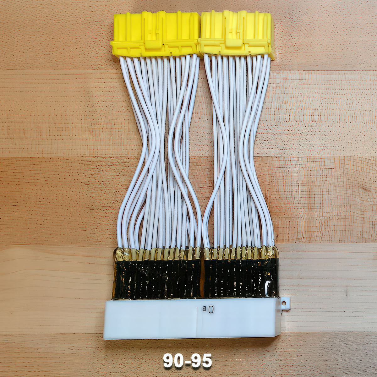 FFS Miata patch harness for 1990–1995 models, overhead view showing the white main connector and yellow branch connectors