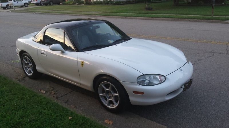 Three-quarter view of Jason's white 1999 Miata