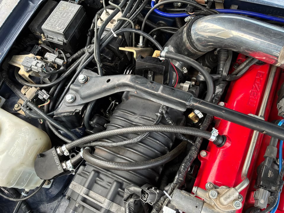 Angled view of Nathaniel's FFS MP62 installation and red valve cover