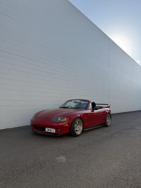 Taj's red Miata with an FFS Standard Supercharger Kit