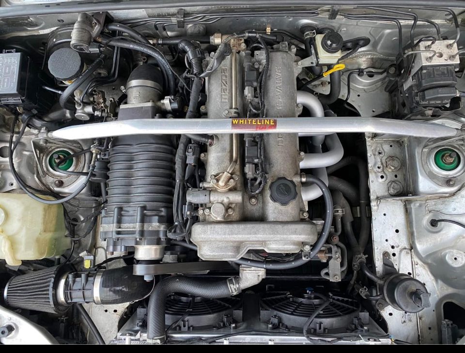 Overhead view of Taj's silver Miata engine bay with an FFS Standard Kit